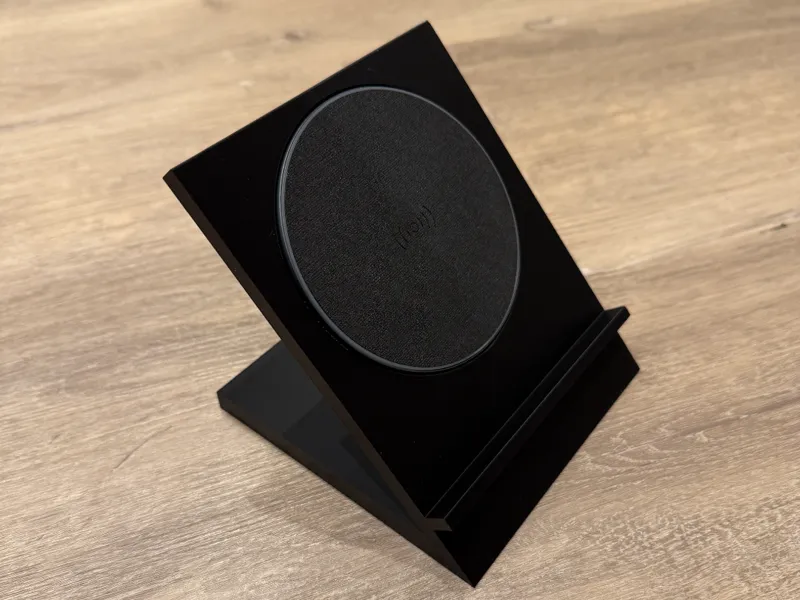 Phone stand for wireless charging pad