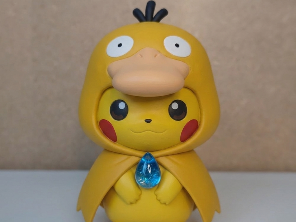 [#025] Psyduck Poncho Pikachu