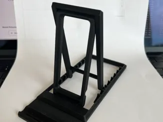 Foldable flatpack phone stand - sits up straight