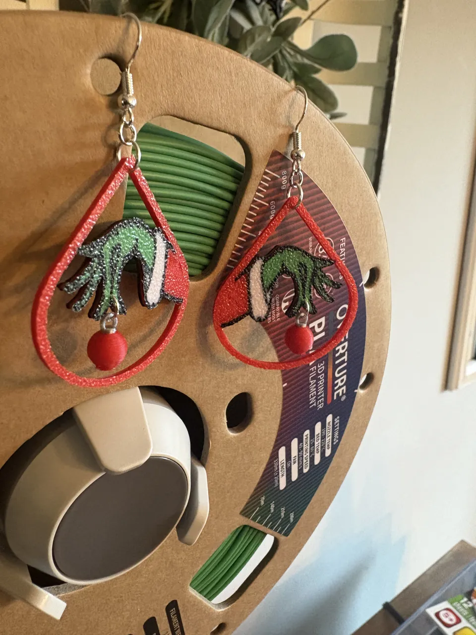 Grinch Holding Ornament Earrings view 3