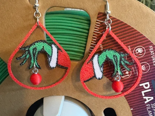 Grinch Holding Ornament Earrings