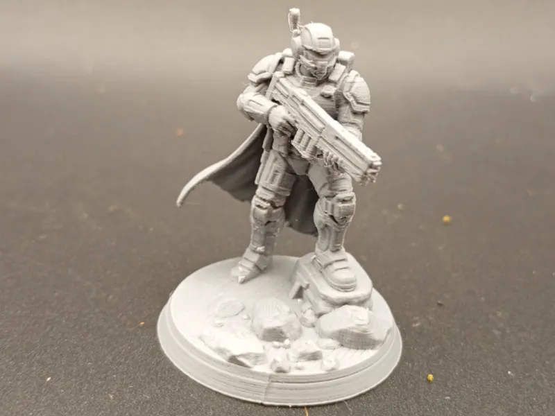 grimdark scifi warrior with lazer gun- wargaming