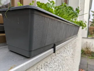 Blumenkastenhalter Fenstersims