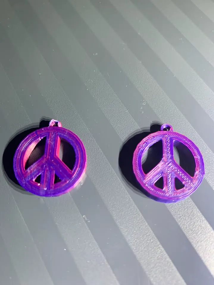 Peace symbol earrings view 2