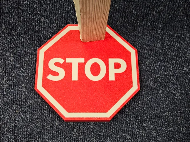 Stop sign door stopper