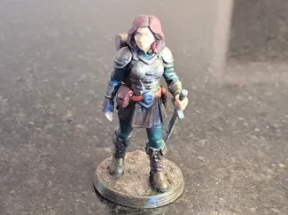 Female model adventurer on round base