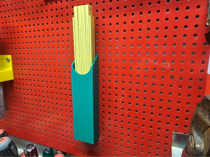 Folding ruler bin for Pegboard