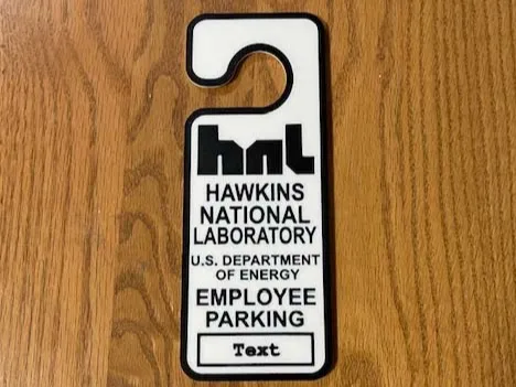 Hawkins National Labratory Parking Placard