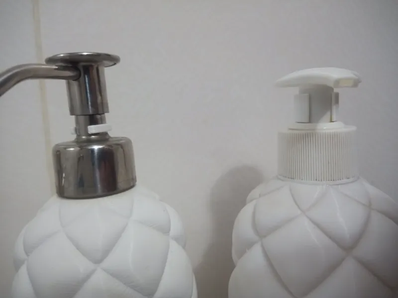 Soap dispenser pump limiter stop ring economizer