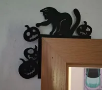 Coin de porte chat poussant des citrouilles — photo 3