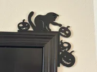 Coin de porte chat poussant des citrouilles — photo 1