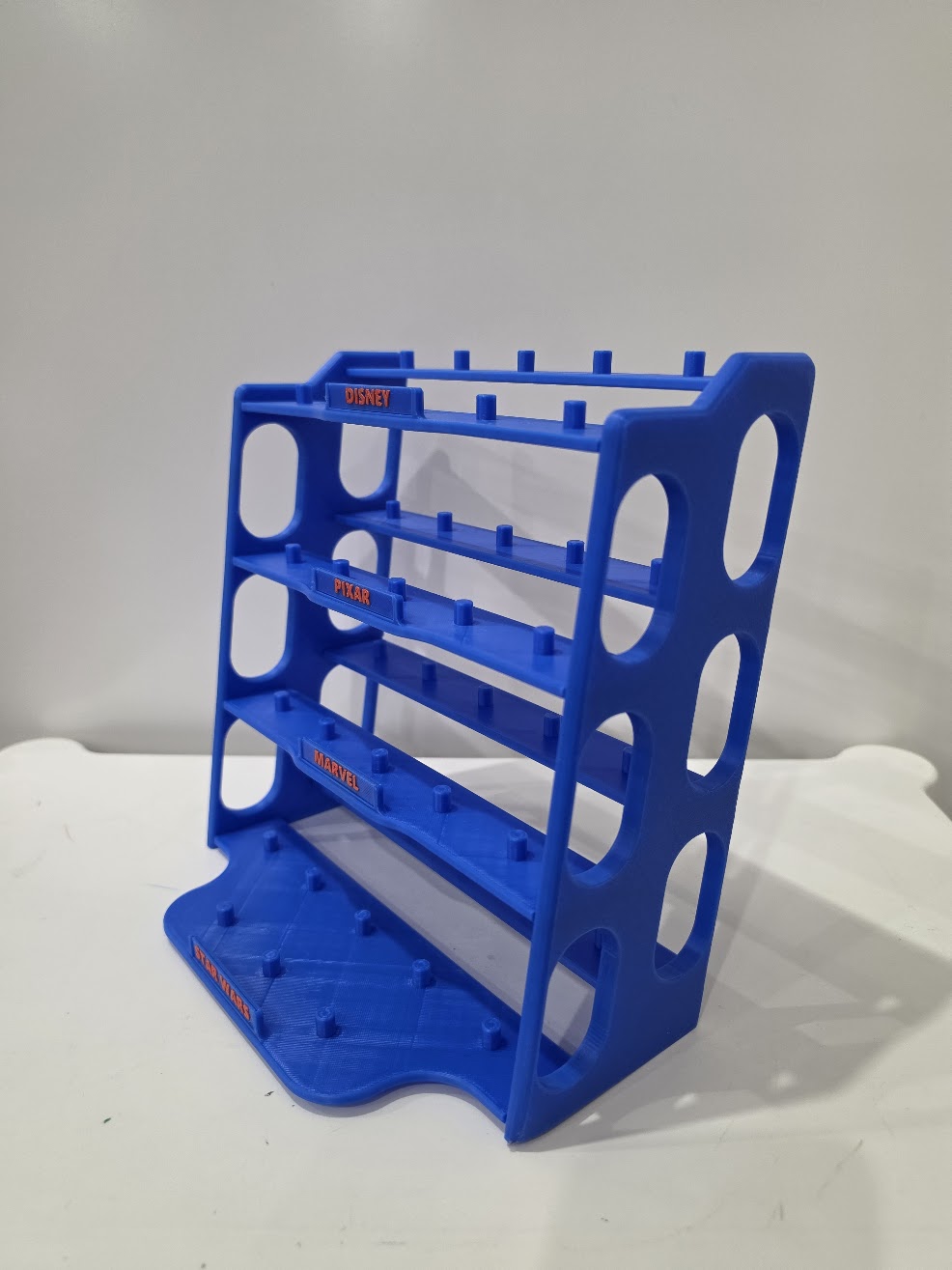 Ooshie Display Stand - Raked/Stadium style design. - 1