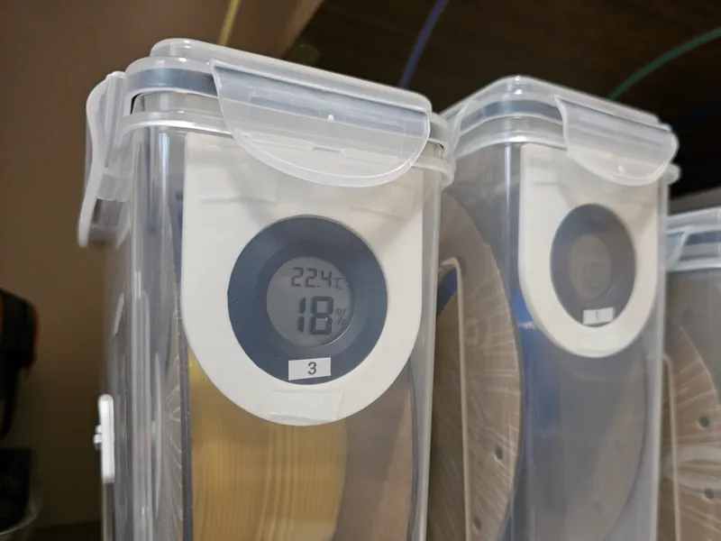 In-box thermometer hygrometer holder