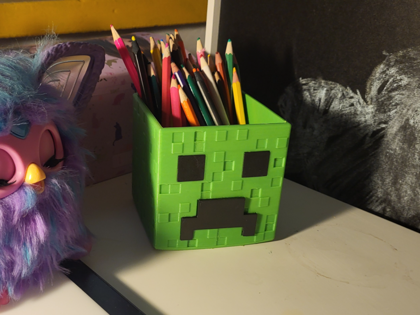 Creeper head crayon holder