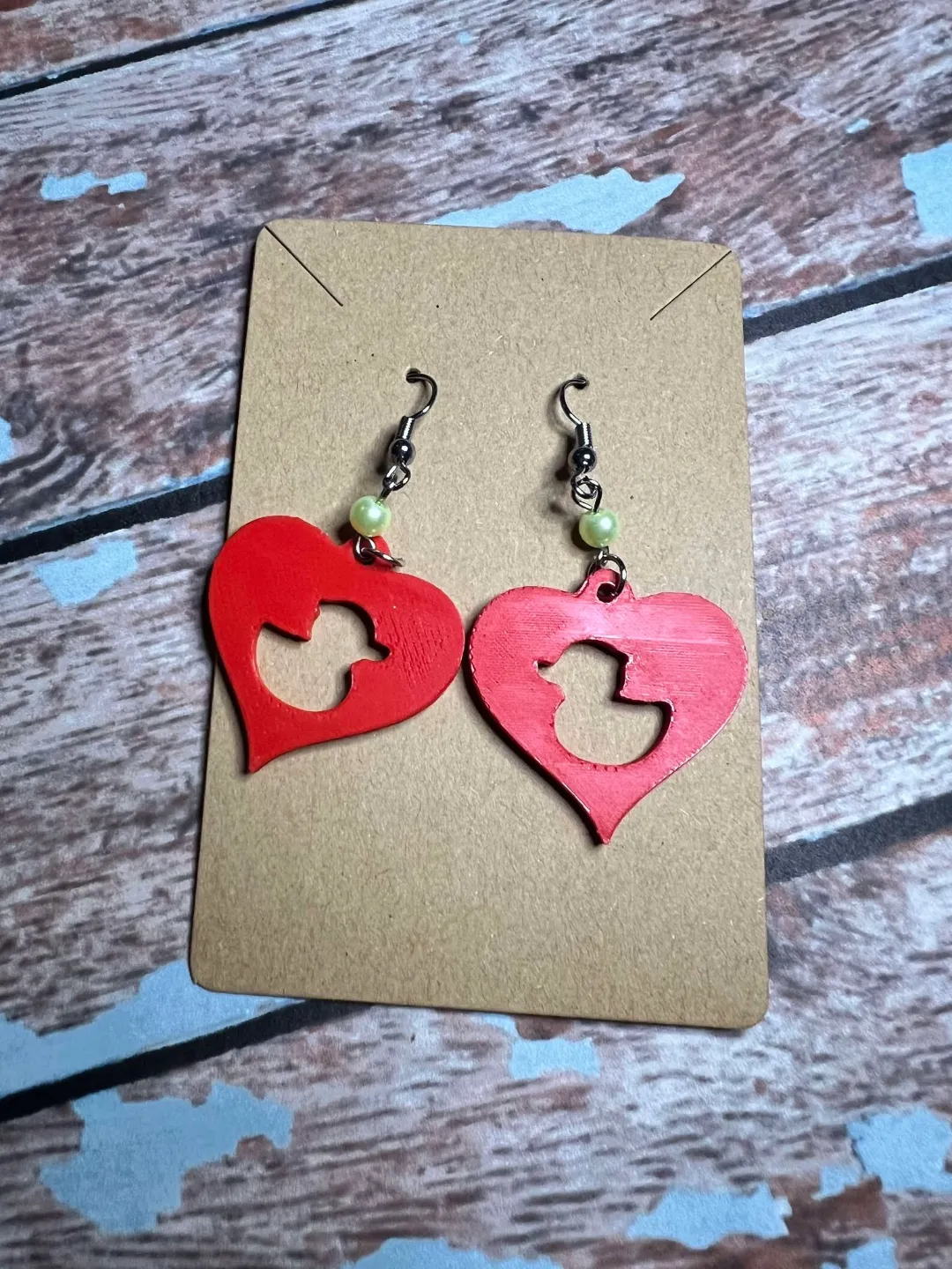 heart earring with duck cut out view 4
