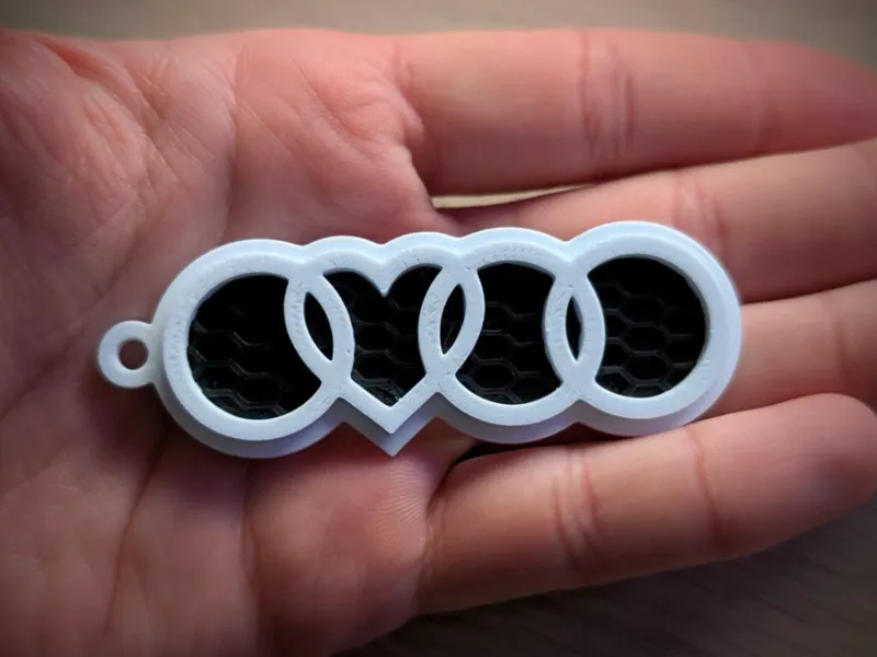 Porte-clé Audi cœur nid d'abeilles