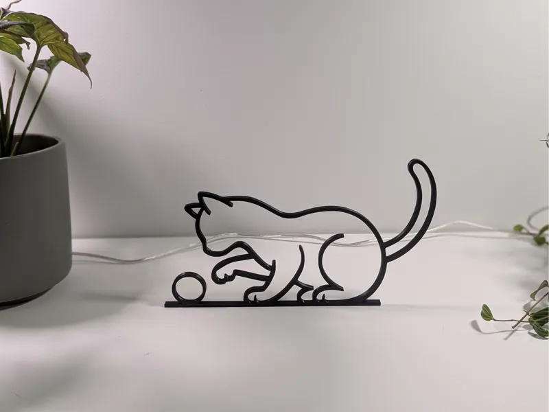 Cat Playing with Ball Decor Desk Table 2D Line Art