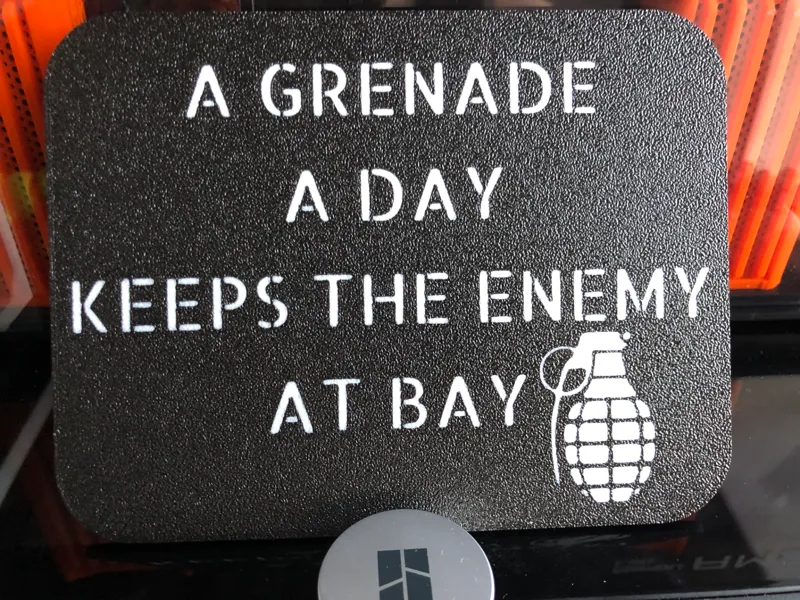 Grenade a day sign