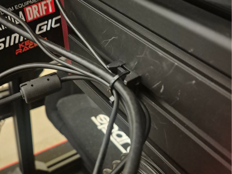 Cable management clip for Simrigs and extrusion
