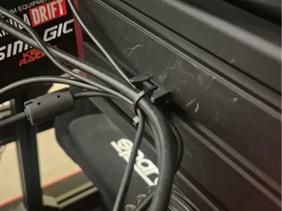 Cable management clip for Simrigs and extrusion