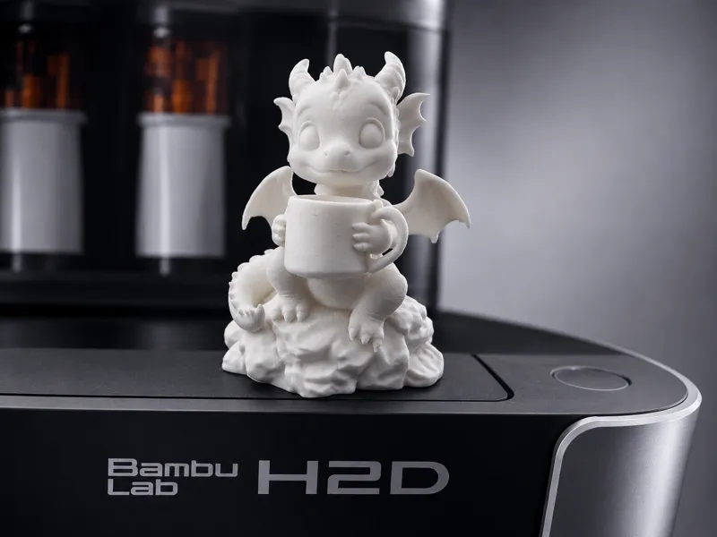 Tiny Dragon Holding Huge Coffee Mug