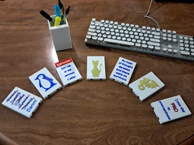 Pencil cup with interchangeable face plates