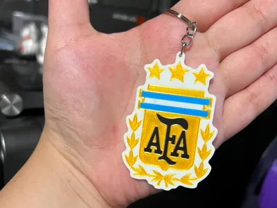 NATIONAL TEAM SHIELD KEYCHAIN