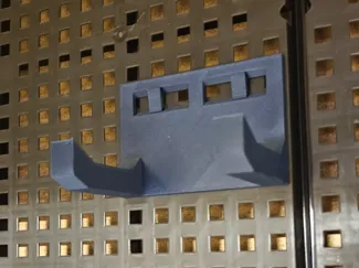 Impact or grinder holder with adjustable hooks 