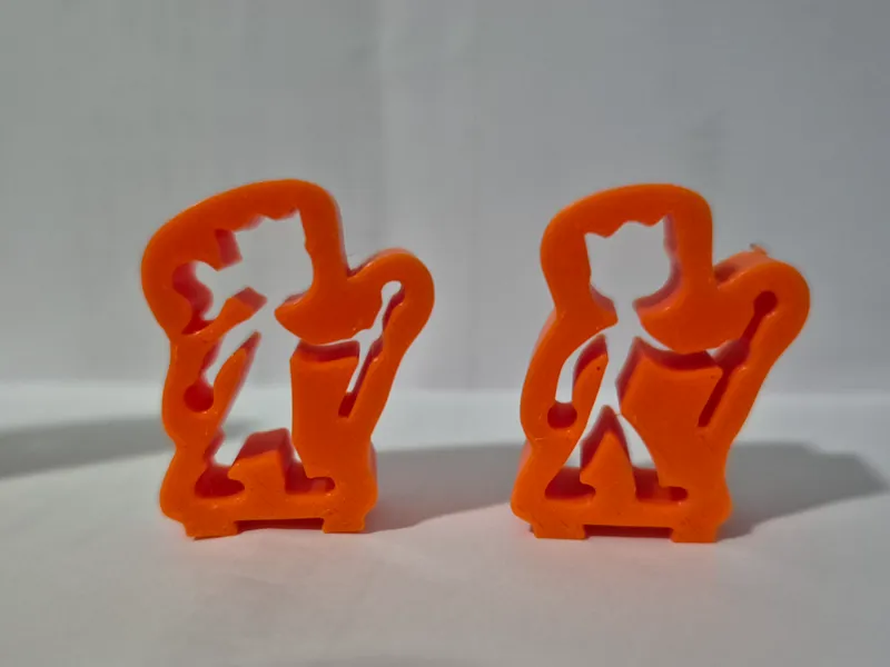 Small king and queen stick figure meeple