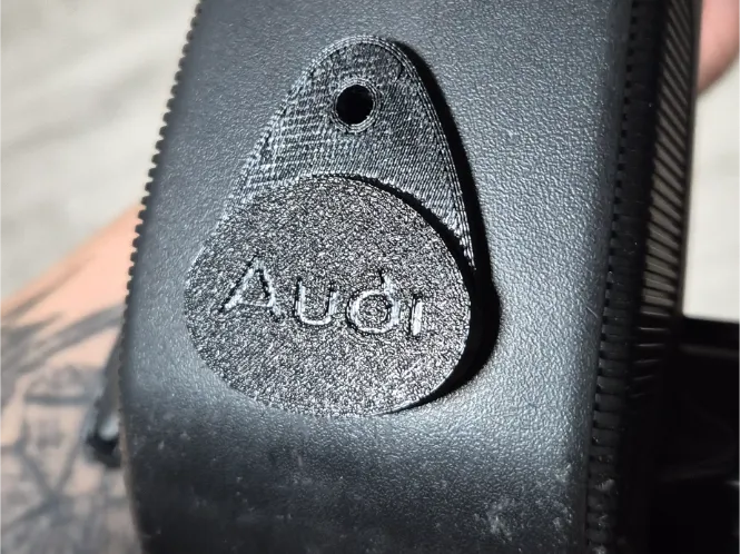Replica of the original Audi 80 trunk lock plug.