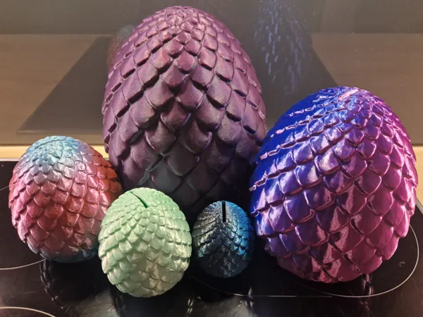 Tirelire œuf de dragon pour pièces en euros