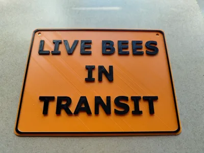 Live bees in transit sign.