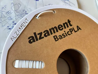 Alzament spool adapter for AMS