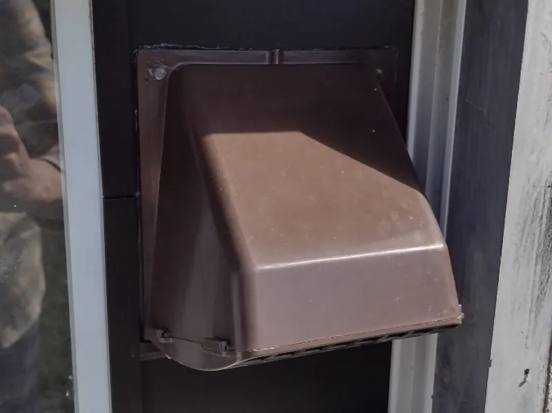 Storm window shim for 4 inch vent pipe