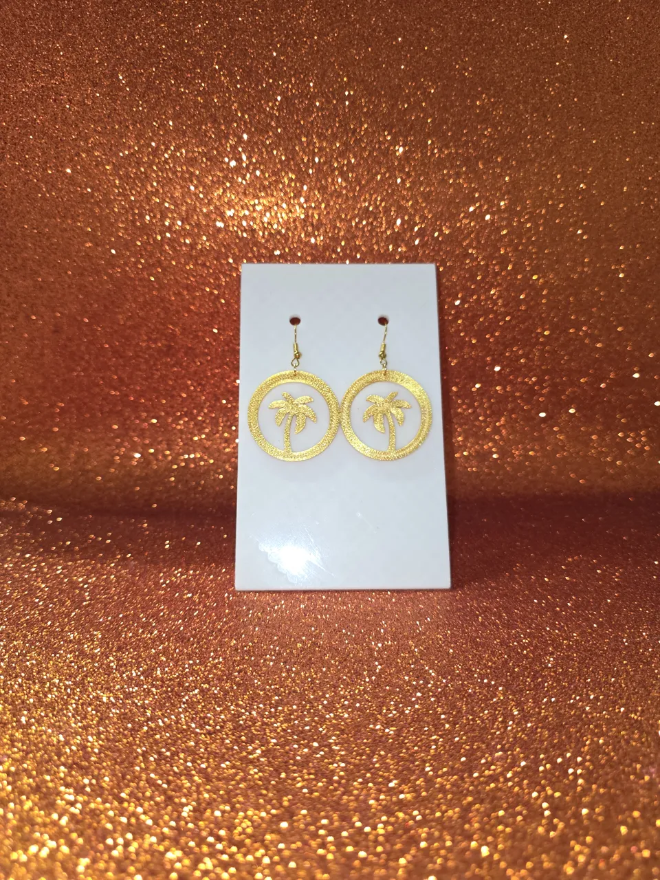 Palm in the circle earrings view 2