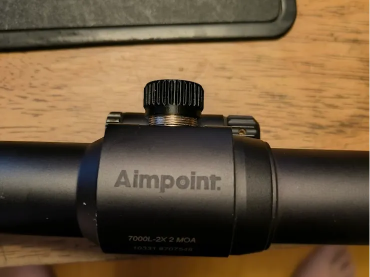 Aimpoint 7000 adjustment screw covers
