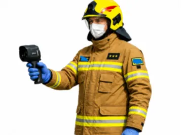 Polish firefighter with a thermal imaging camera
