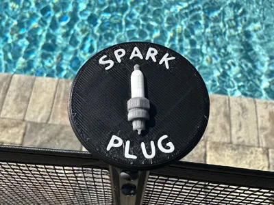 Woggle Spark Plug Award