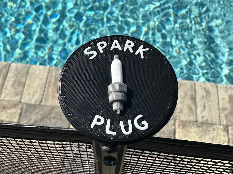 Woggle Spark Plug Award