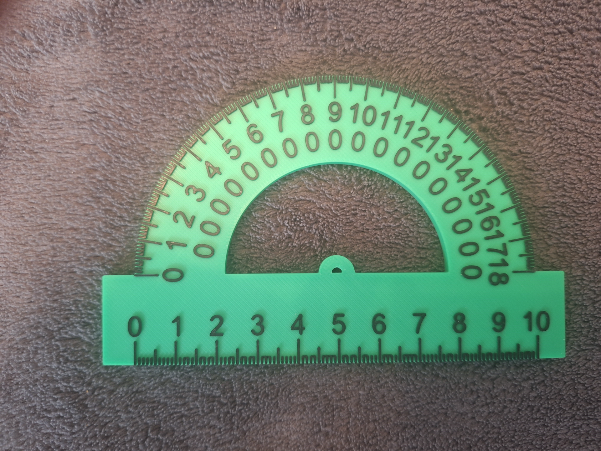 180-degree protractor with a 10 cm ruler