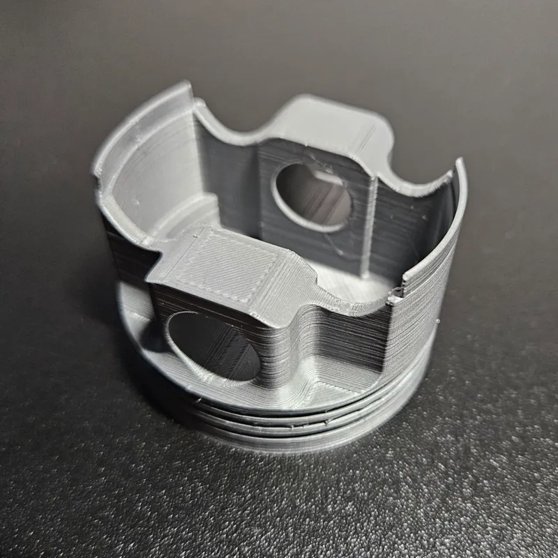 Piston (of an 125ccm engine)
