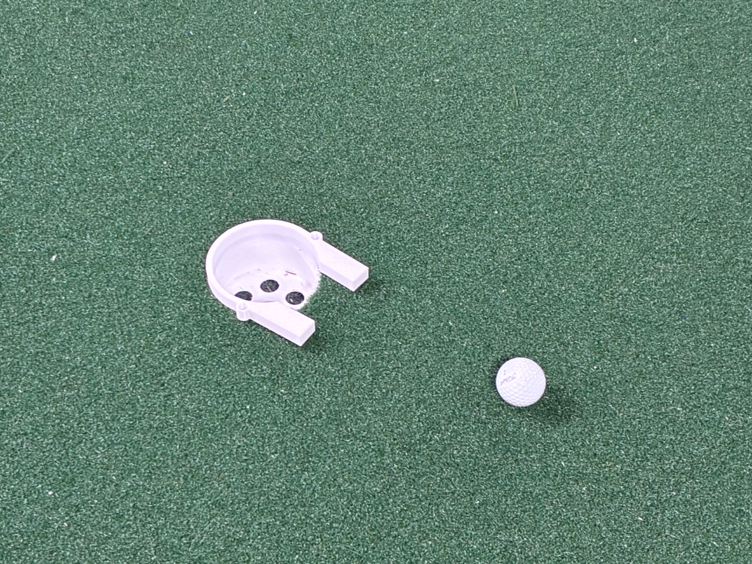 Drain a Putt: Golf training aid