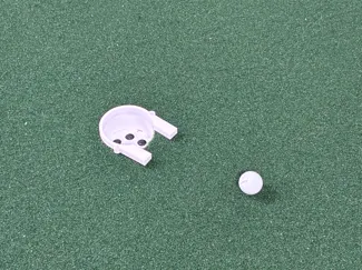 Drain a Putt: Golf training aid