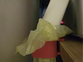 Poop chute with bag holder