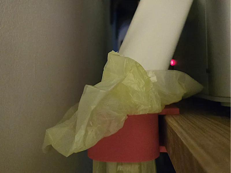 Poop chute with bag holder