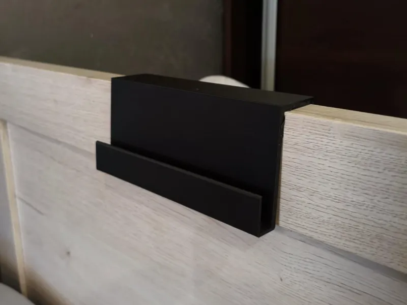 Phone holder for bed