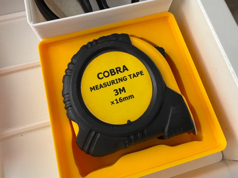 Generic measuring tape holder for gridfinity 