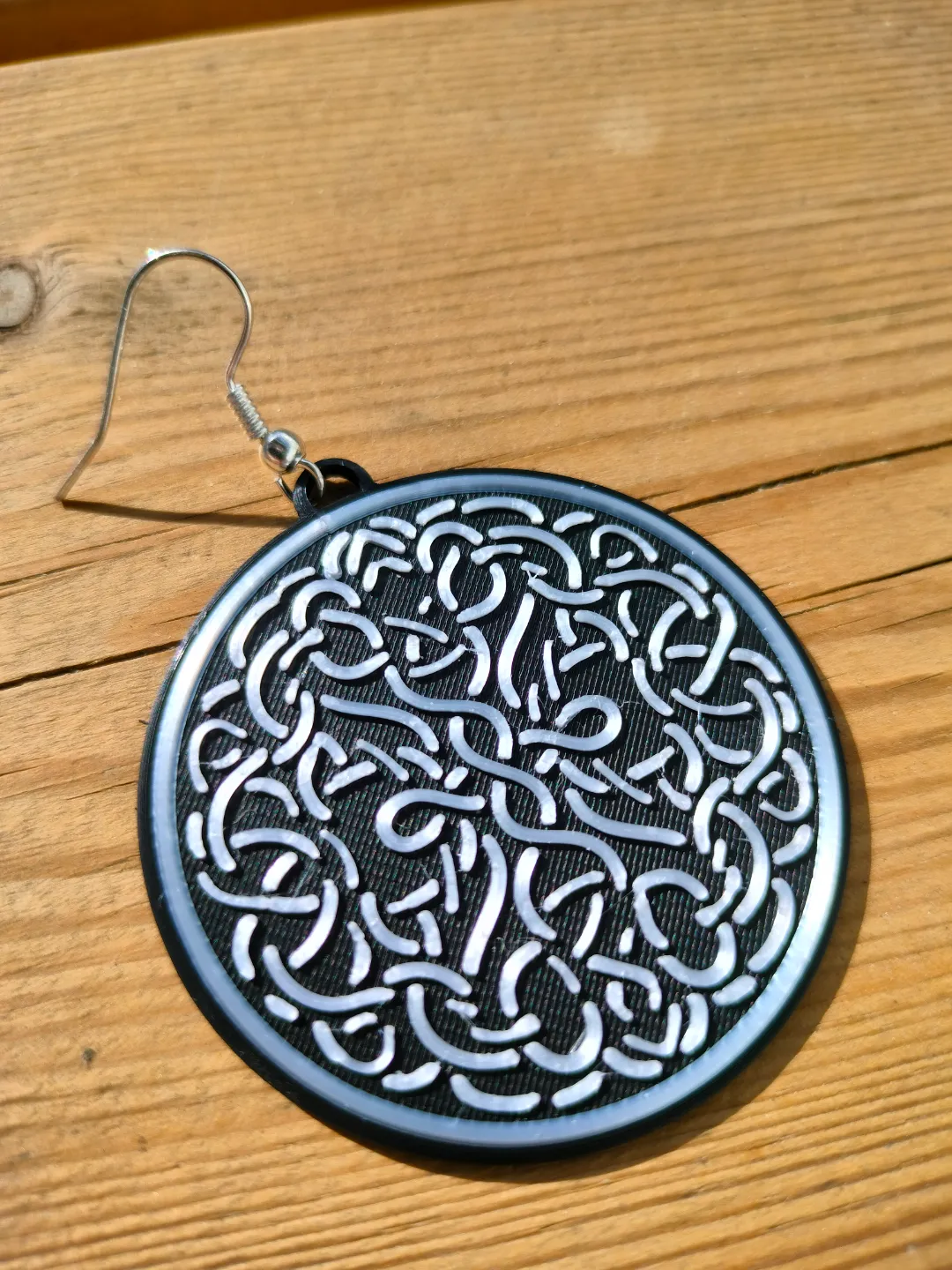 Earrings with a braid pattern view 2