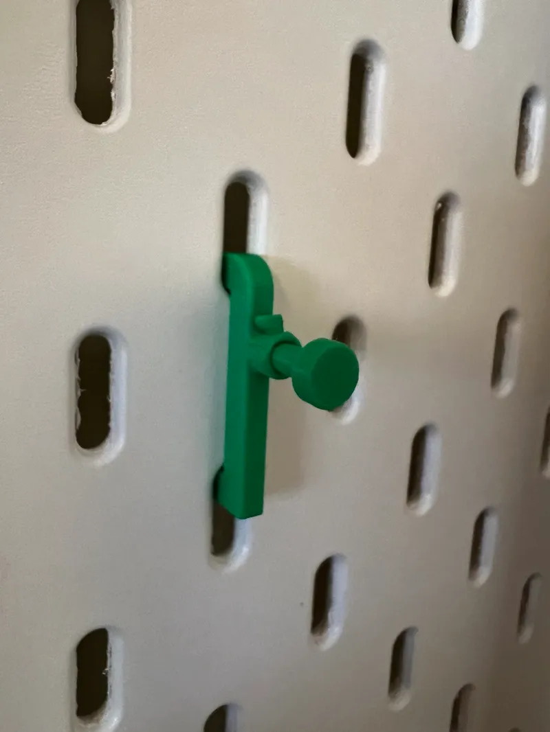 Skadis universal hook with replaceable peg