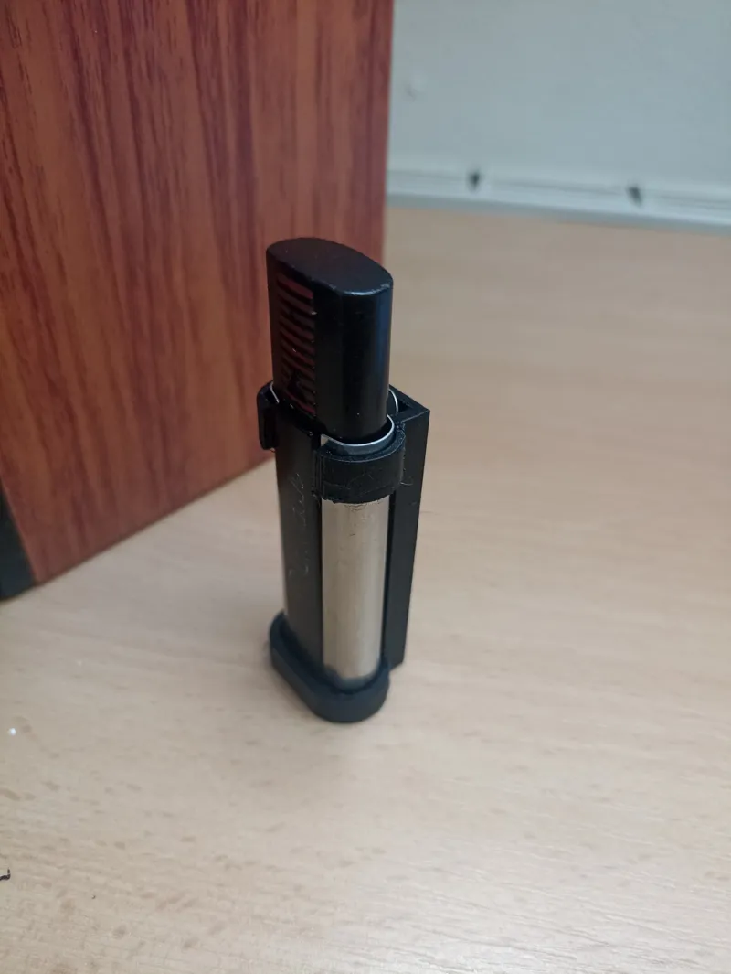 Garage door remote control holder